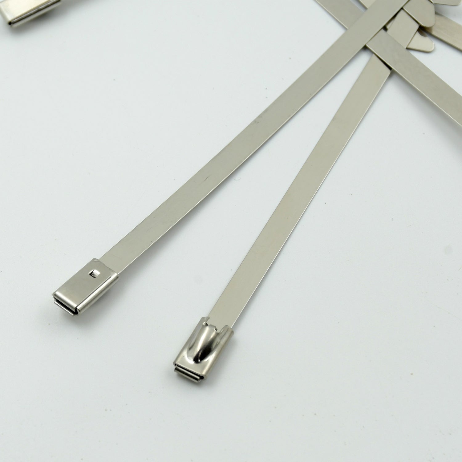 WipeTech's corrosion-resistant stainless steel cable fasteners against a metallic background.
