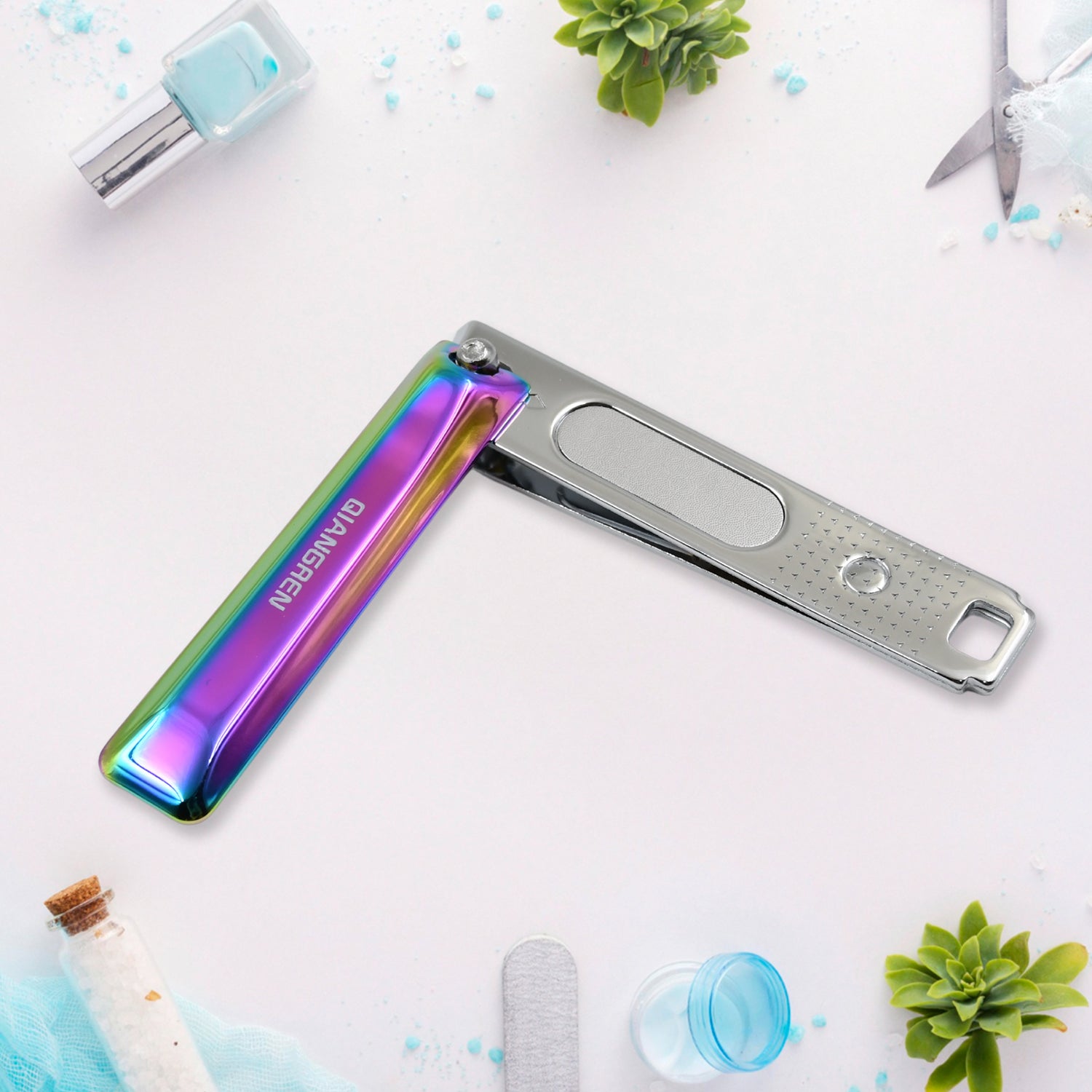 Portable nail clippers with an integrated nail file for complete nail care.
