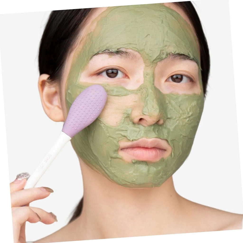 Side view of the versatile silicone mask brush, showcasing its compact design.