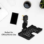 PHOBIA black mobile charging wall holder securely installed on a power socket.