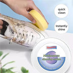 Person using Velvet Wipe shoe cleaner to effortlessly remove a dark stain from a white sneaker.