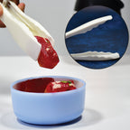 Durable plastic handle kitchen tongs in a modern design.