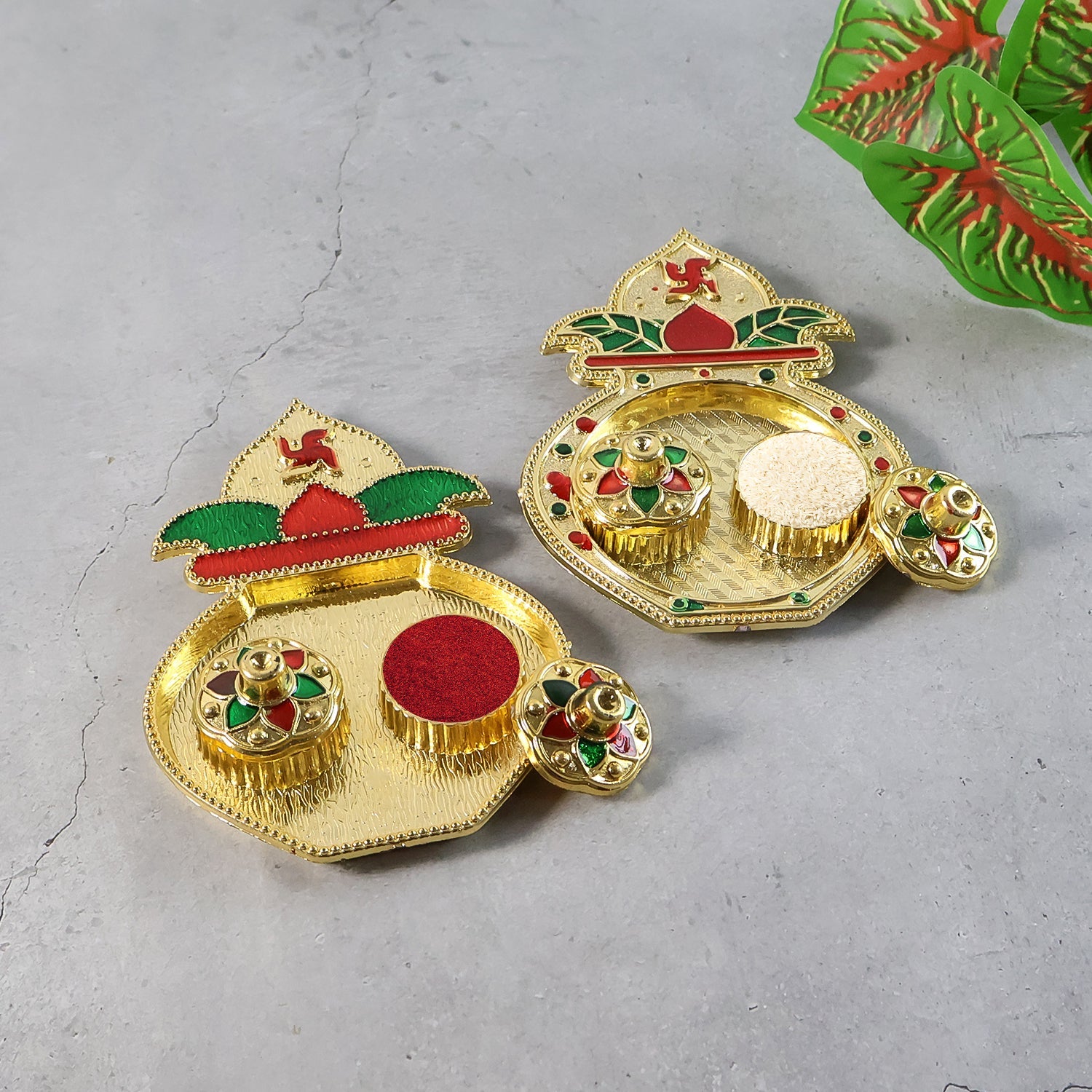 Top view of decorative Kalash kumkum box with colorful enamel effect finish