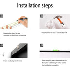 Person wearing cotton safety gloves holding wall mounting tools during setup