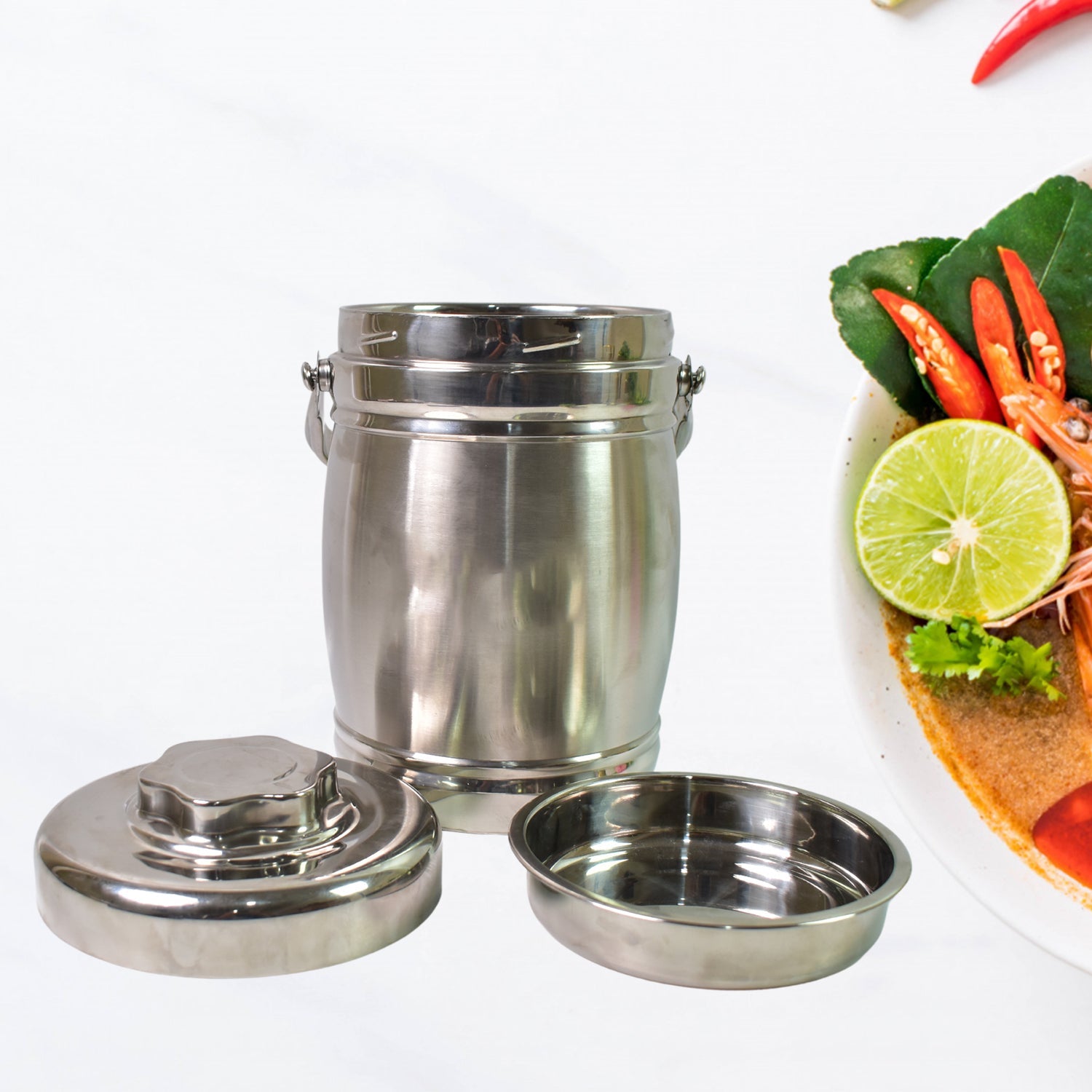 Portable hot food container with an ergonomic handle.