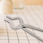 Premium stainless steel kitchen utensil pincer designed for heat resistance