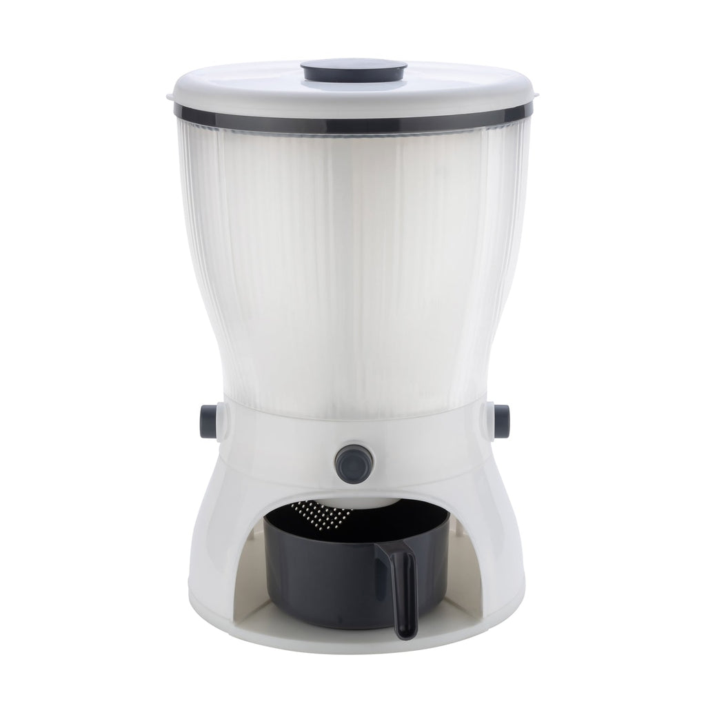 Detailed view of the easy-to-use push-button dispensing mechanism on the rice dispenser.