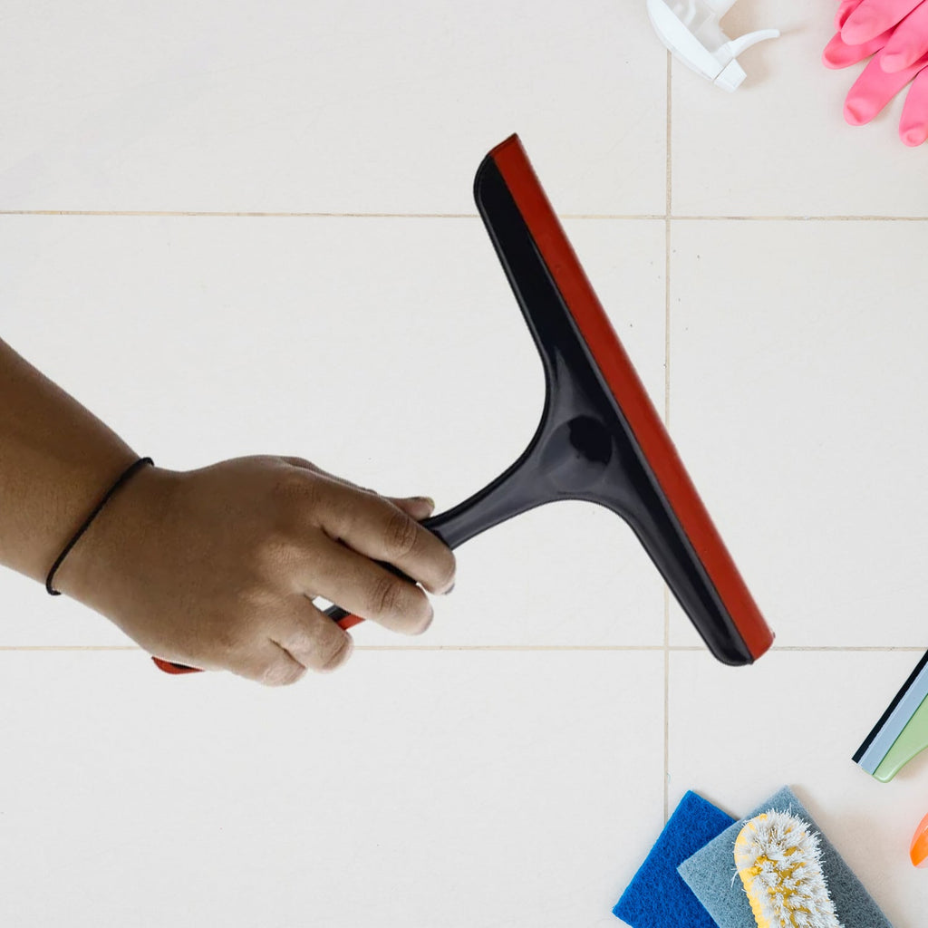 Sturdy plastic handle of the kitchen wiper with a convenient hanging provision for storage.