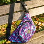 Camouflage waist belt bag securely fastened around waist for active lifestyles