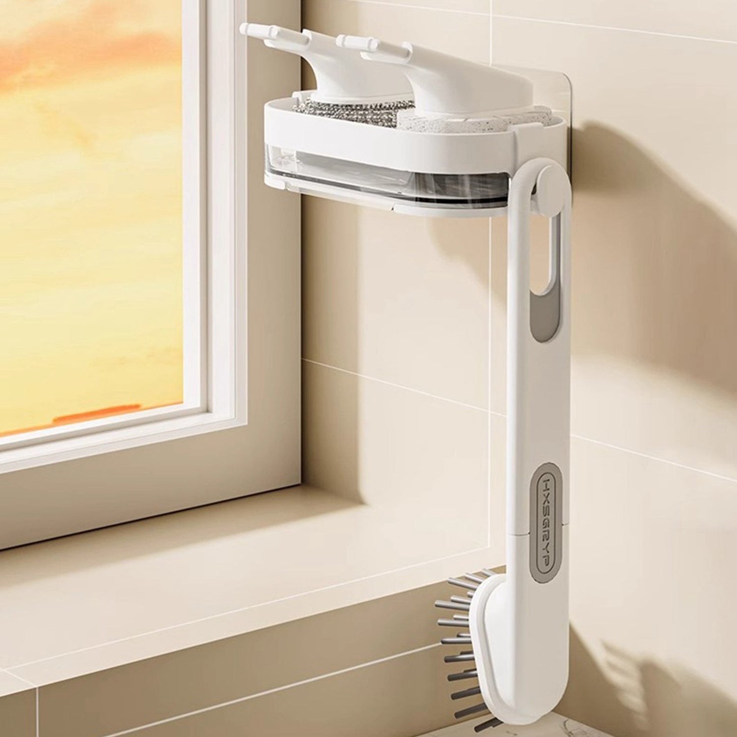 Cleaning brush and tray organiser mounted on wall for sink cleaning