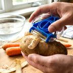 Compact kitchen peeler tool designed for peeling and slicing