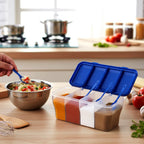 Top view of the open 4-section spice organizer, showing individual spoons in each compartment.