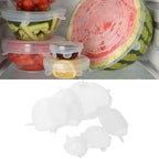 Silicone stretch lids creating an airtight seal on a bowl of food, keeping it fresh in the refrigerator.