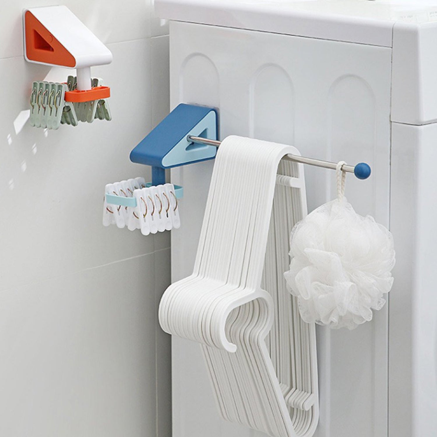 Modern self-adhesive kitchen utensil holder installed on a tiled wall.