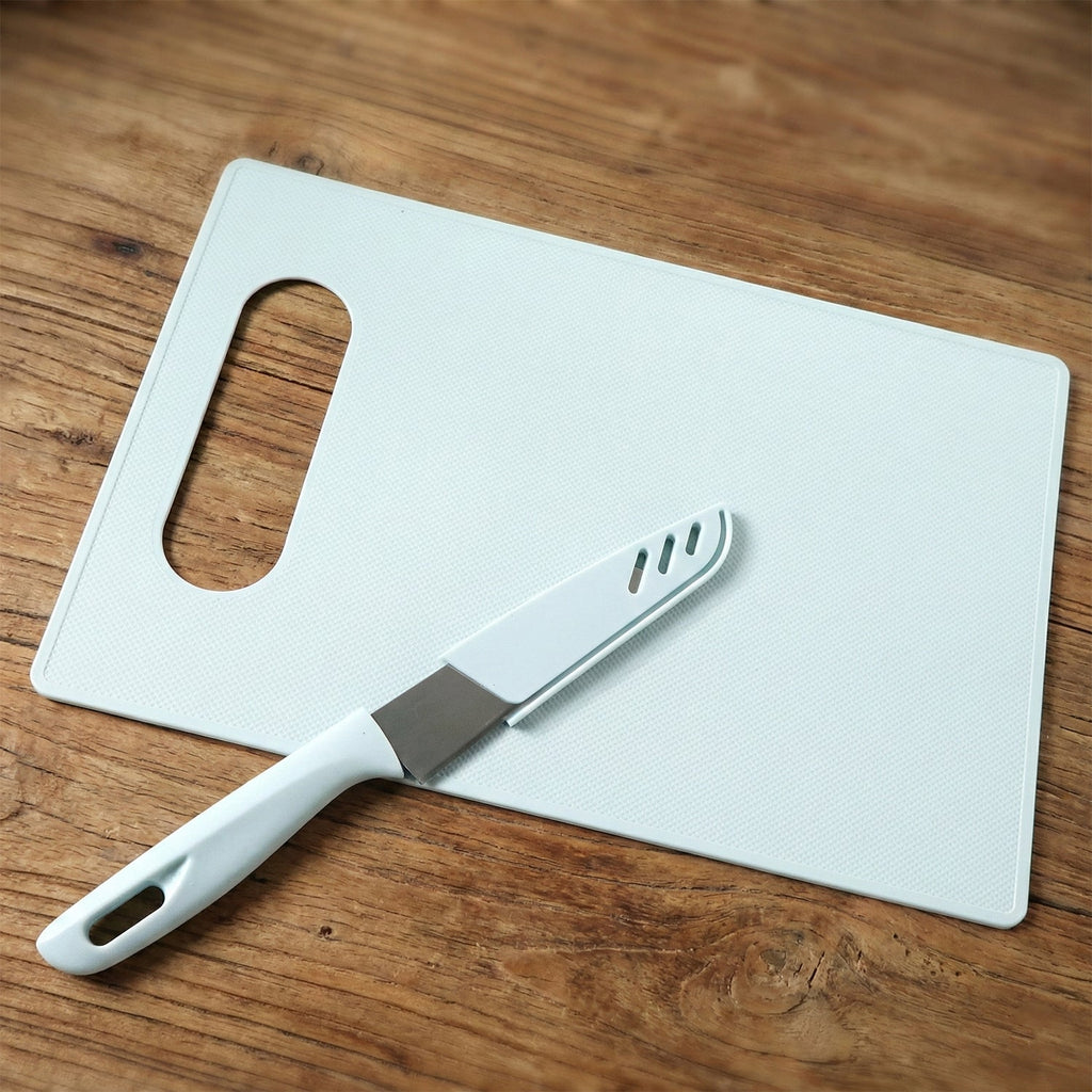 Kitchen chopping board and sharp knife ideal for fruit and vegetable cutting