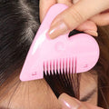 Gentle baby hair scissors with heart-shaped handle and sharp stainless steel blades.