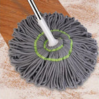 Close-up of stainless steel handle on self wringing mop offering durability