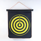 Roll-up double-sided dartboard game showing portable hanging target mat
