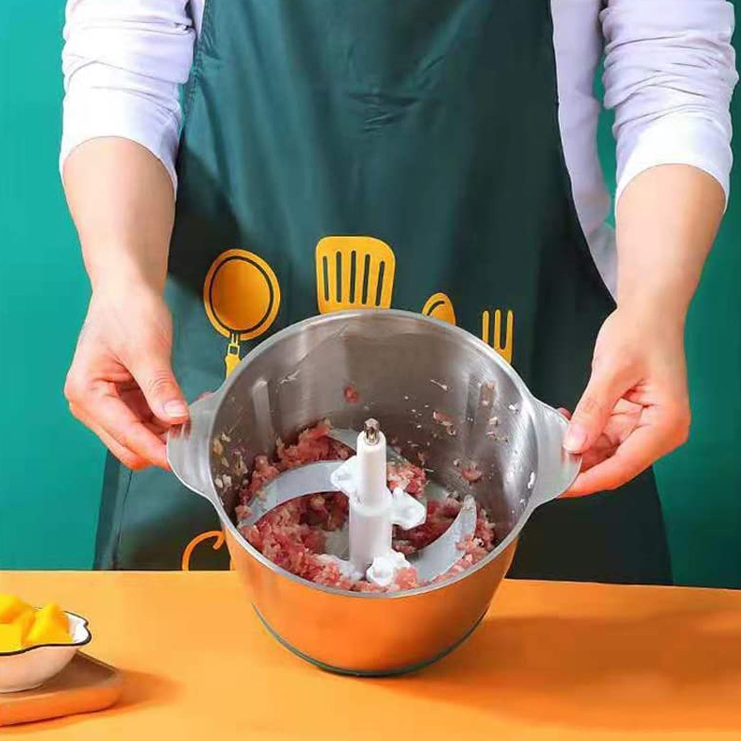 Side profile of the CookAura electric meat grinder, emphasizing its sturdy build.