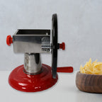 Close-up view of the hardened stainless steel blade on the chips maker.