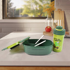 A child's hand opening the blue leak-proof lunch box set, ready for a meal.