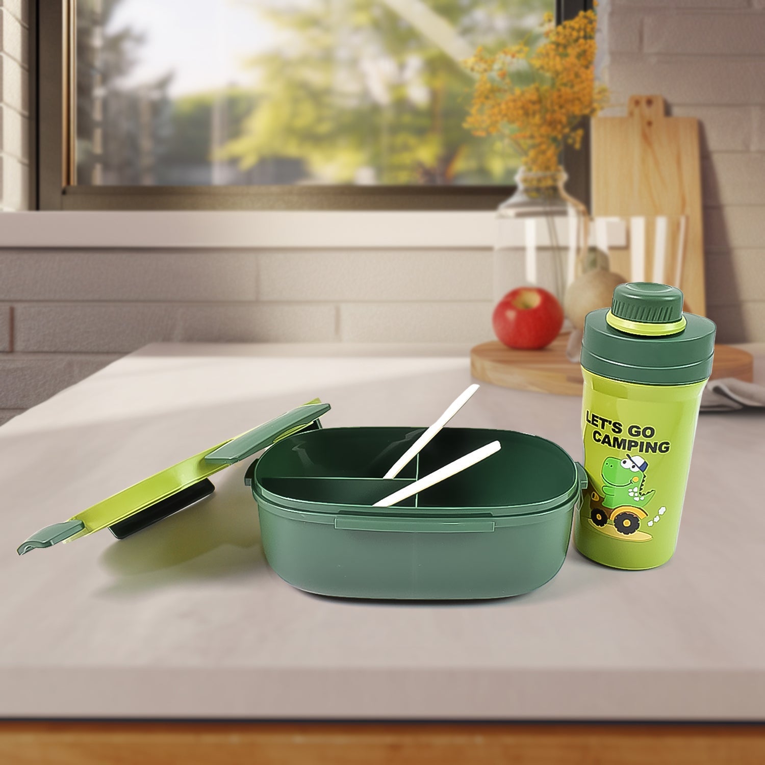 A child's hand opening the blue leak-proof lunch box set, ready for a meal.