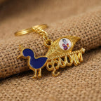 Backside view of Krishna keychain highlighting gold-tone metal craftsmanship