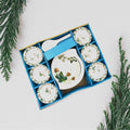 Elegant 9-piece pudding serving set arranged on a table.