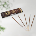 Close-up of unlit mixed floral incense sticks, showing their natural texture.