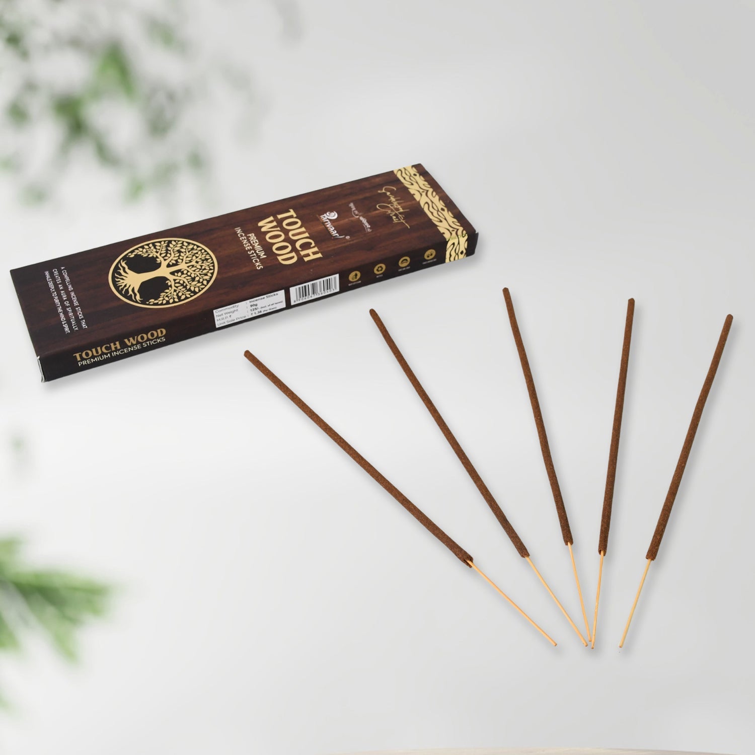 Close-up of unlit mixed floral incense sticks, showing their natural texture.