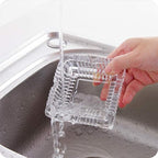 A square crystal ashtray, reflecting light beautifully on a tabletop.