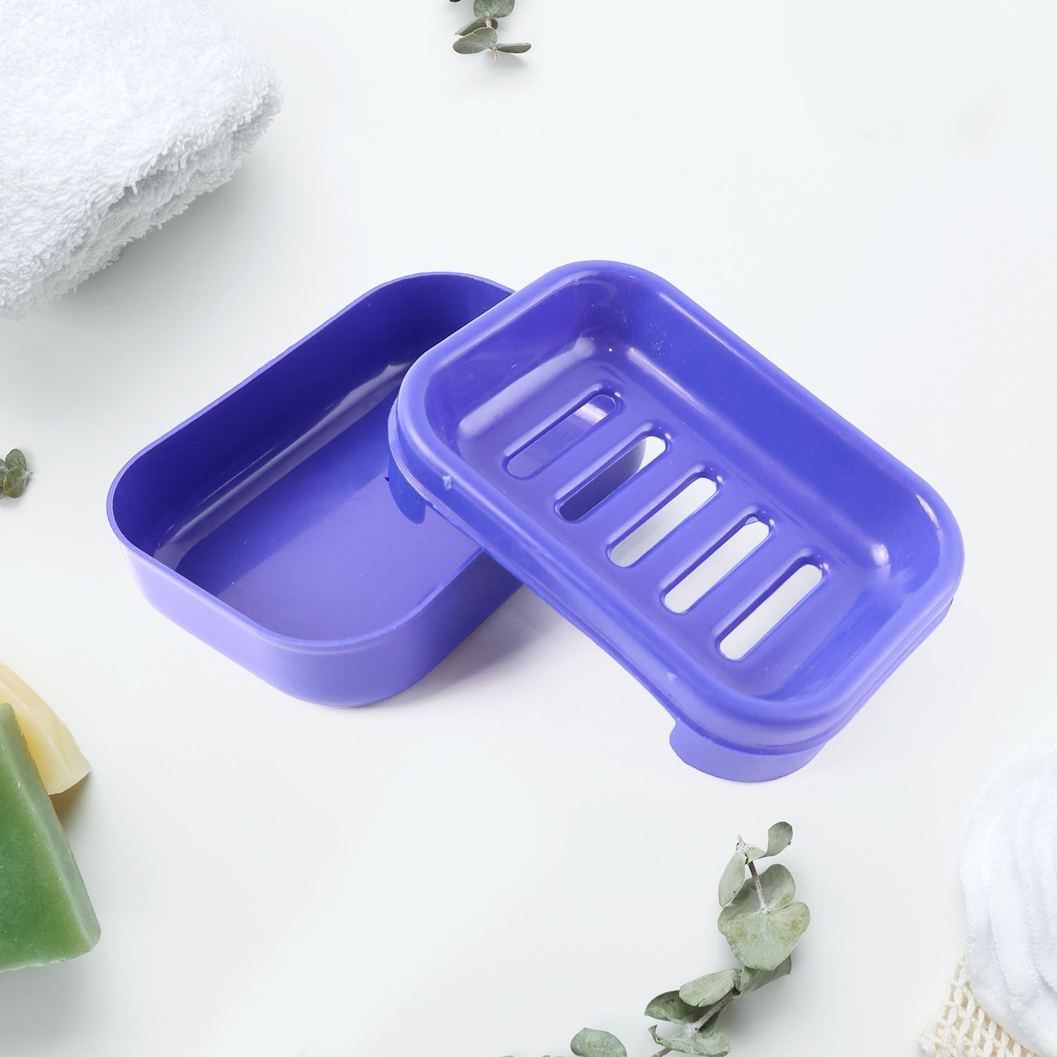 Blue soap case showing slotted drainage base to keep soap dry