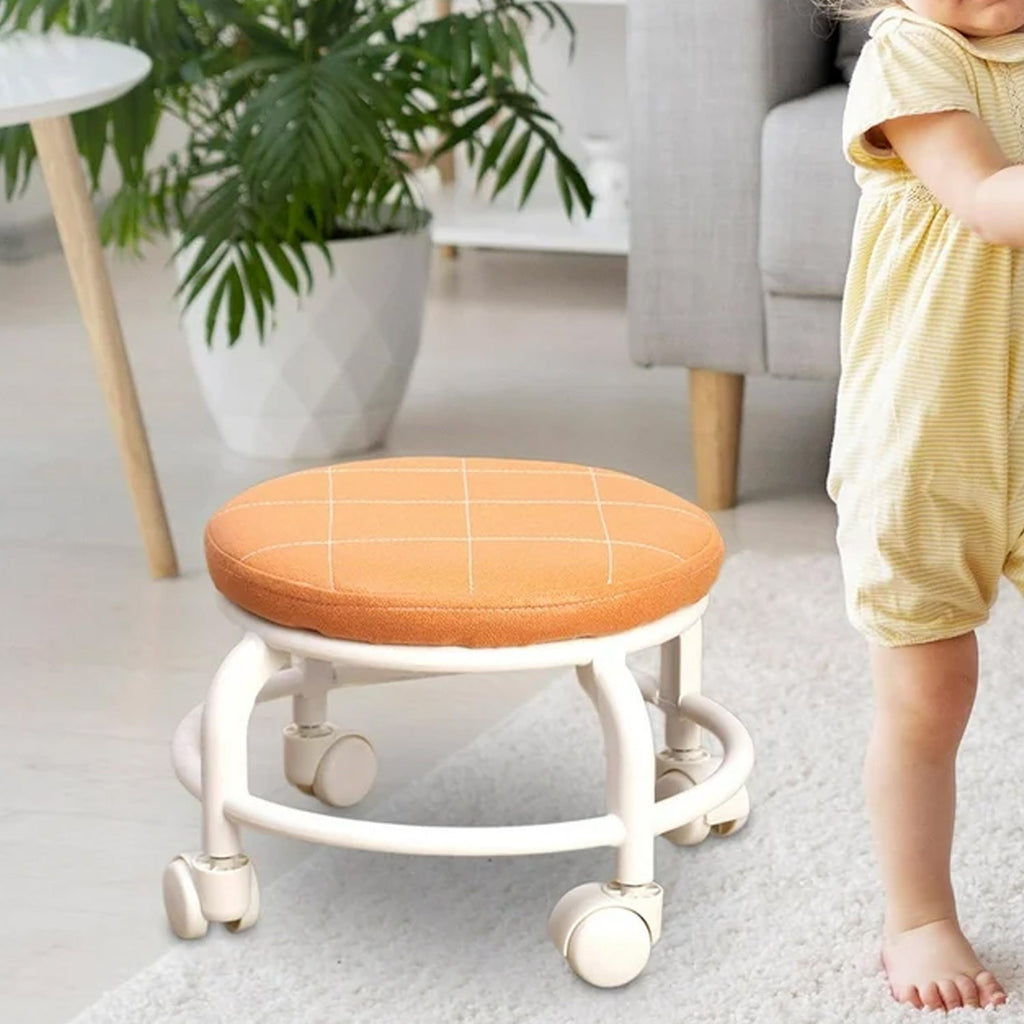 Compact white rolling stool with 360-degree swivel wheels.
