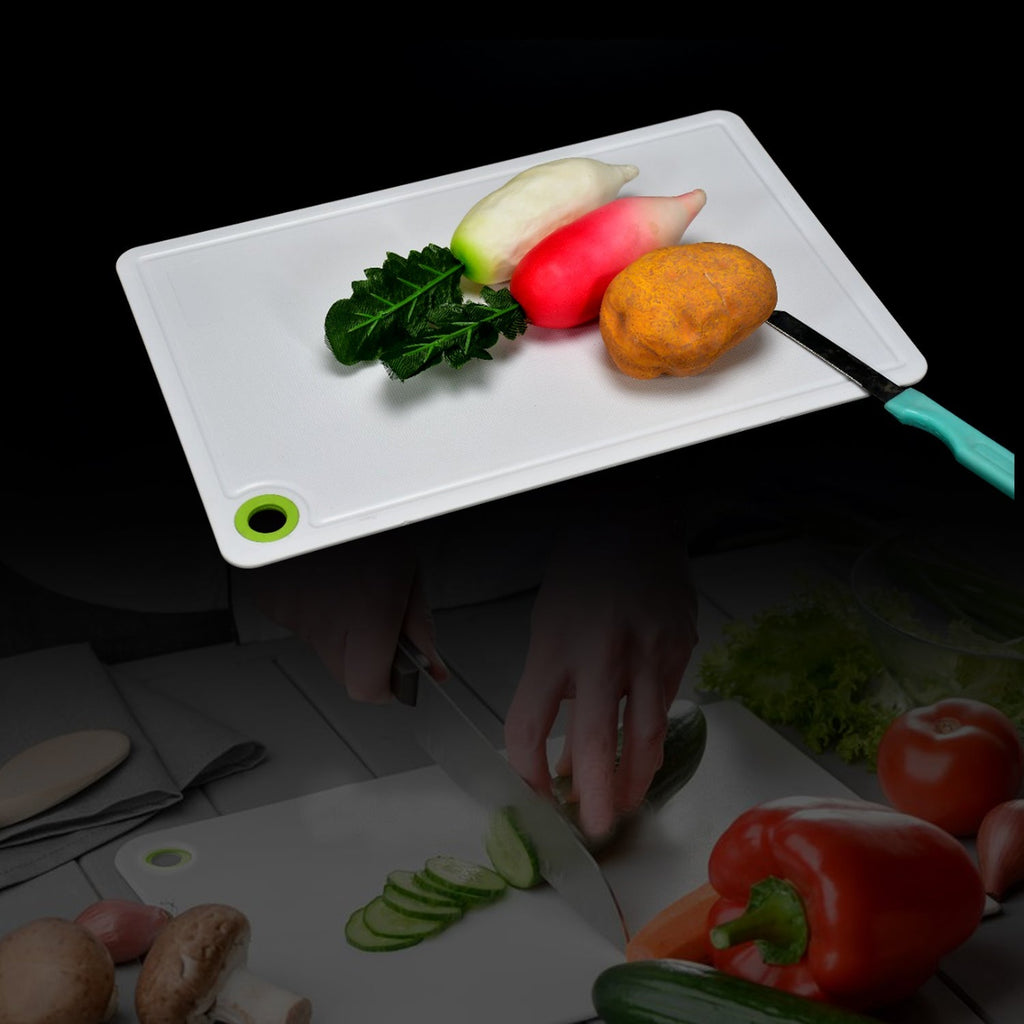 Durable plastic chopping board for fruits and vegetables, essential for every Indian kitchen.