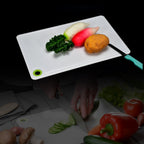 Durable plastic chopping board for fruits and vegetables, essential for every Indian kitchen.