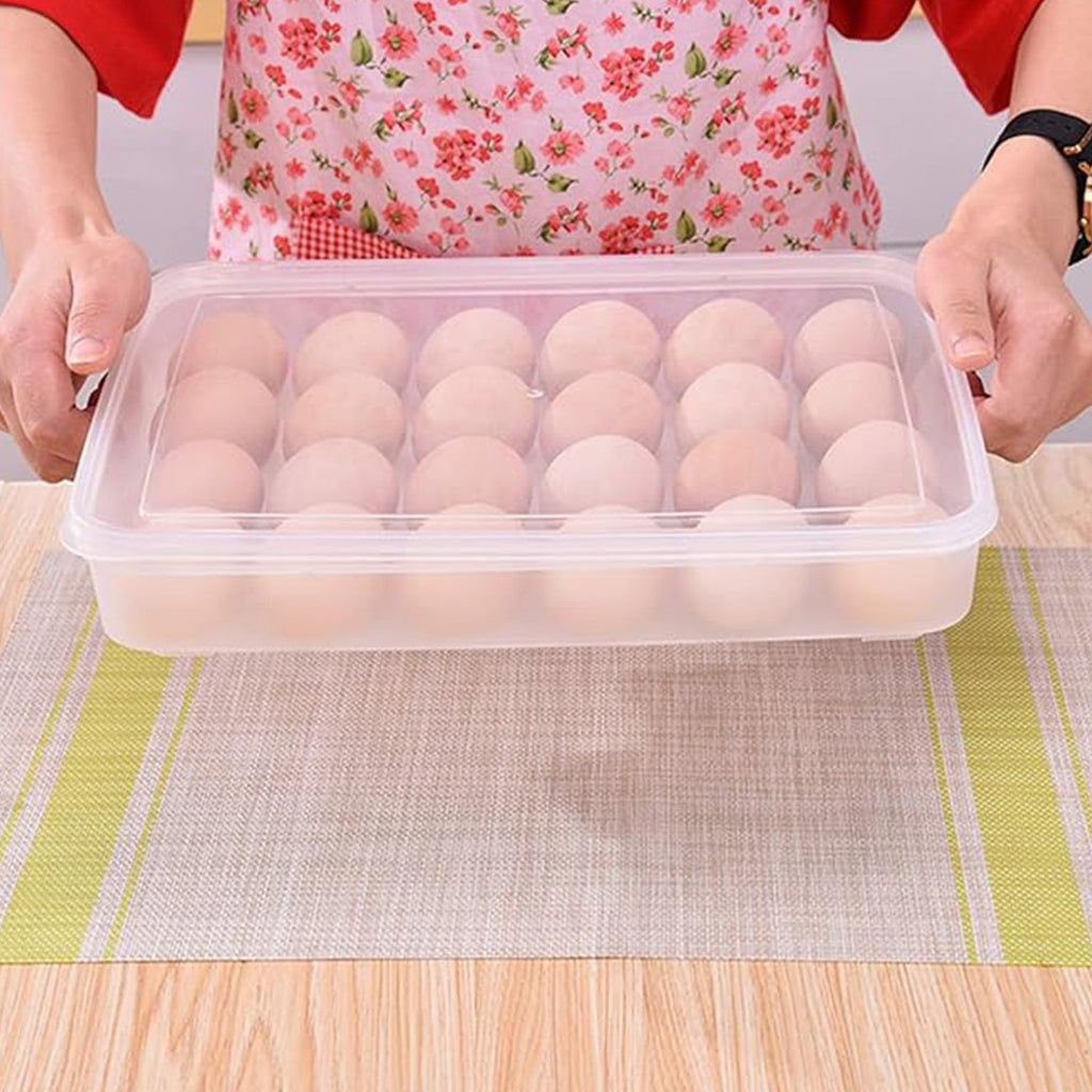 Clear plastic egg container holding 24 eggs viewed from above
