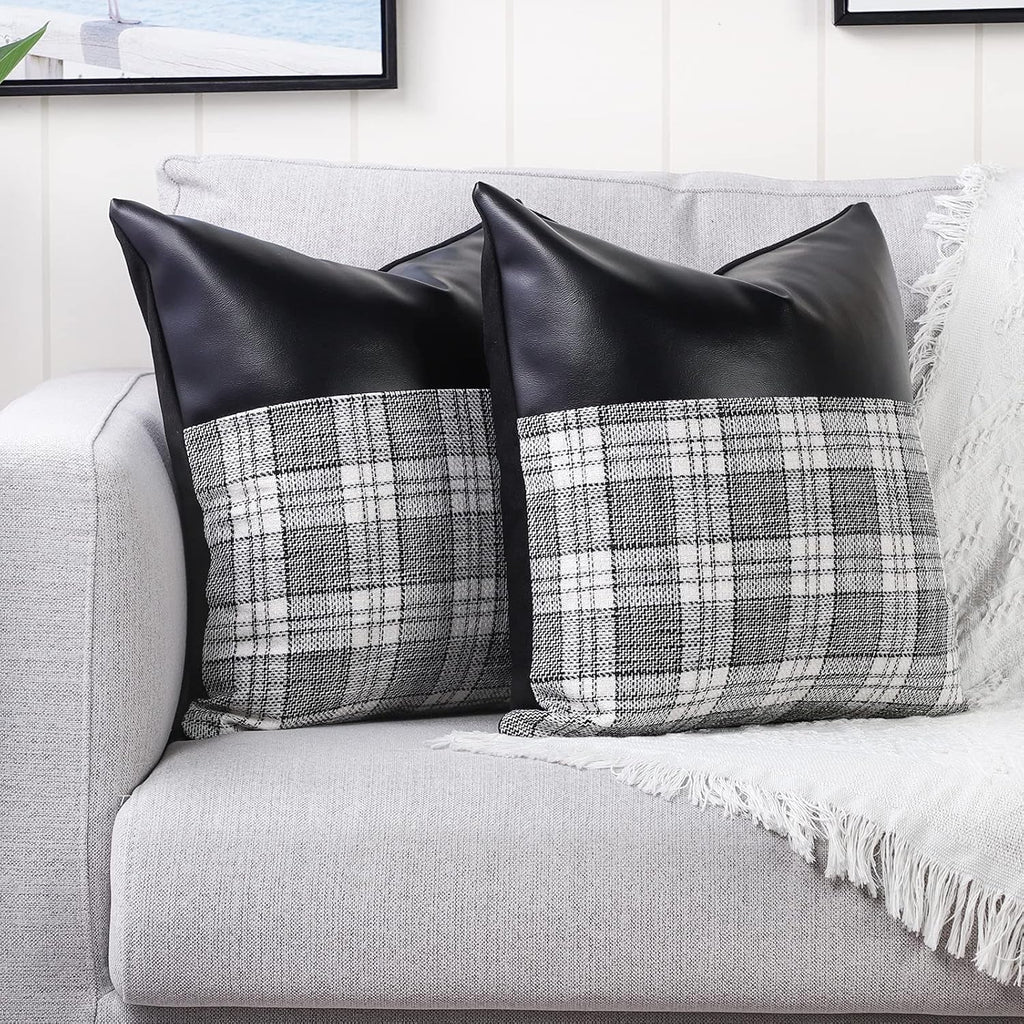 Lifestyle image of the Leather & Cotton Pillow Covers enhancing a modern living room sofa.