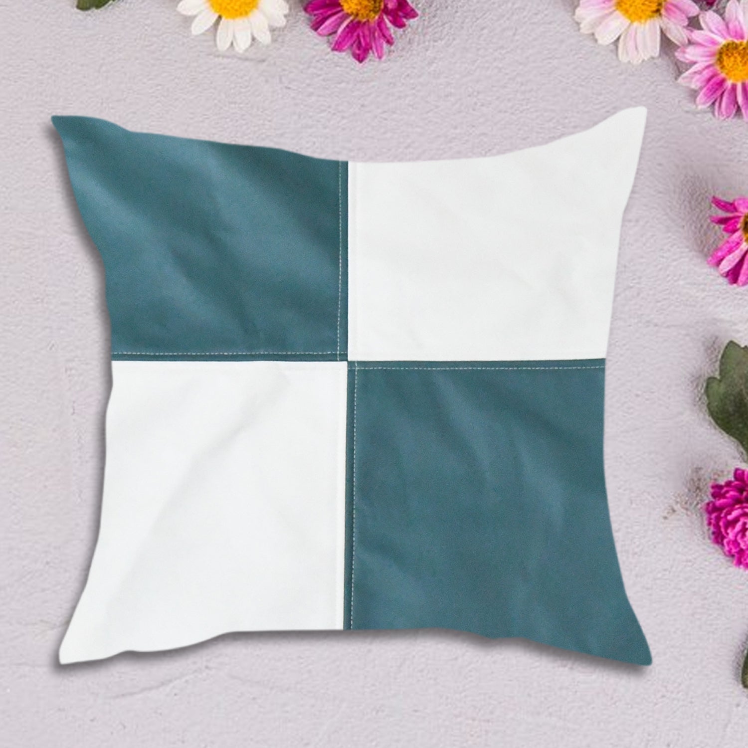 Soft decorative pillow cover in a light colour on a modern living room sofa.