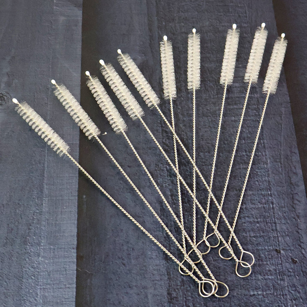 Cleaning brush designed for deep cleaning bottles and tubes with durable bristles