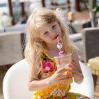Assortment of reusable plastic straws with diverse truck shapes and bright colours.