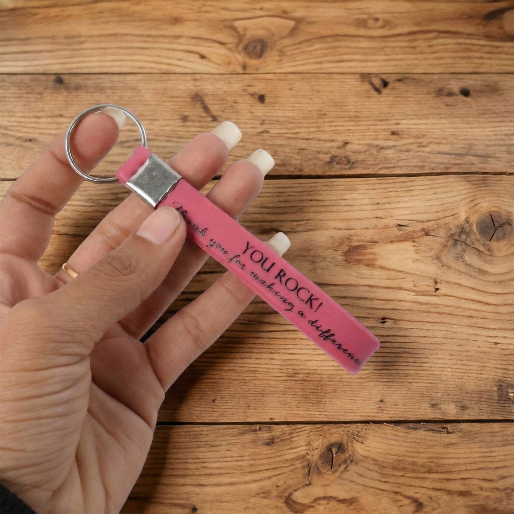 Motivational silicone wrist strap keychain in mixed colors with inspirational quote