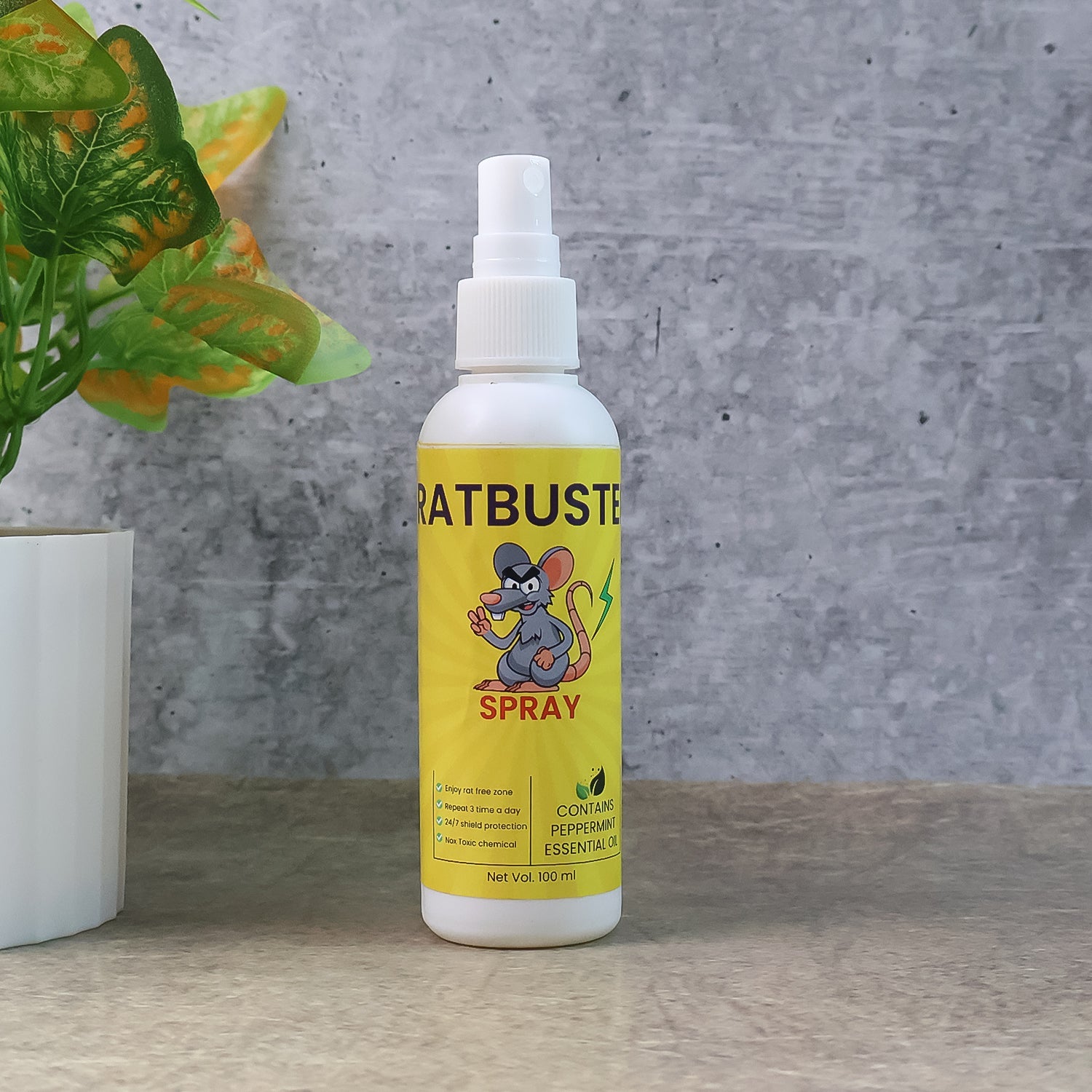 Close up of rat repellent spray bottle with natural formula
