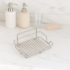 Soap holder tray in a clean bathroom setting with stainless steel build