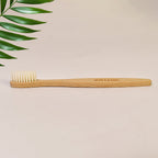 Ergonomic wooden handle of MintGuard bamboo toothbrush for comfortable grip