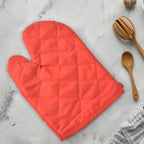 Detailed view of the oven mitt's textured surface for a secure, non-slip hold.