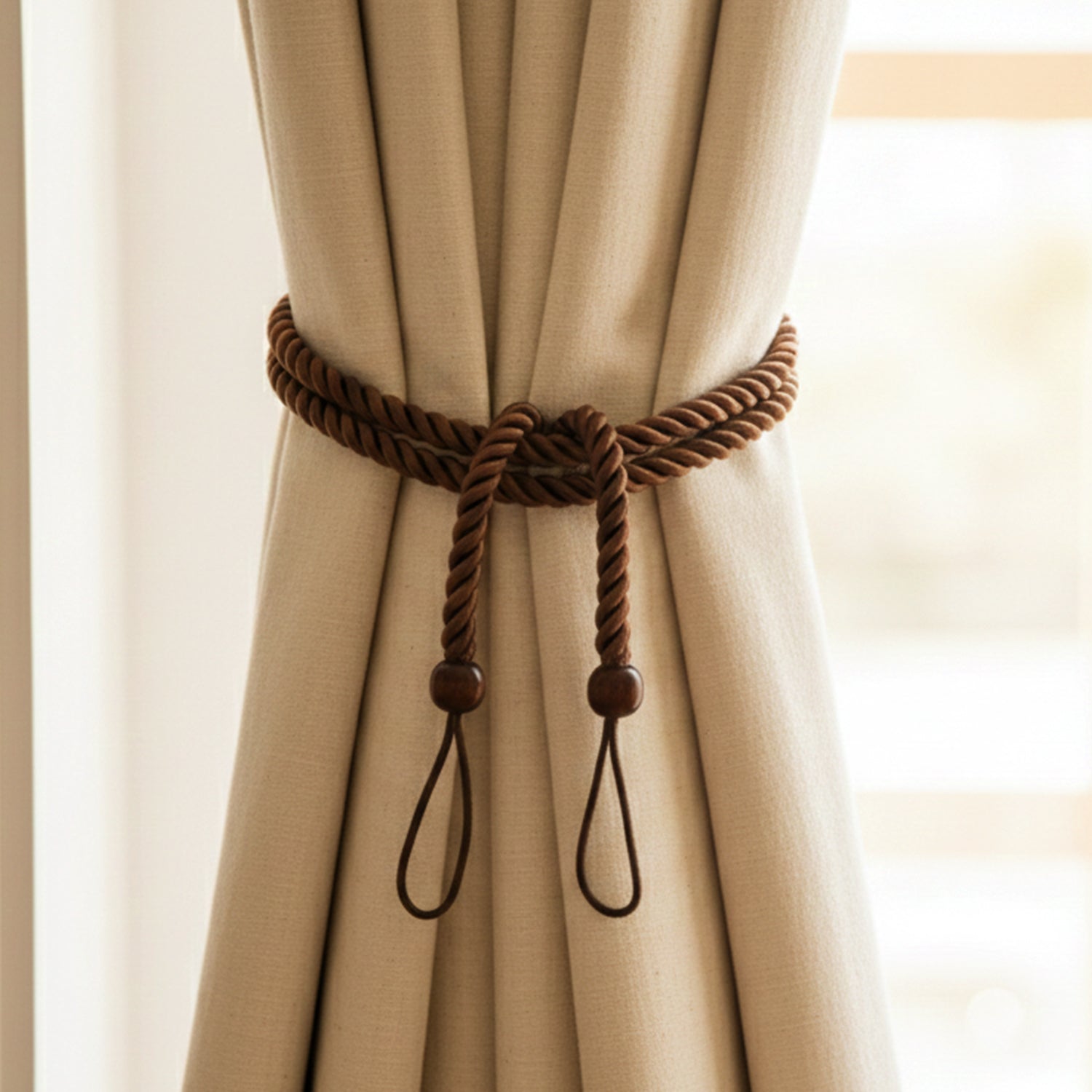 Curtain strap with decorative rope and floral accents for windows