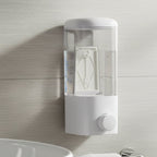 Wall mount lotion dispenser featuring manual push button