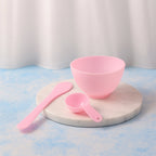 Facial mask mixing bowl accompanied by spatula and measuring spoon