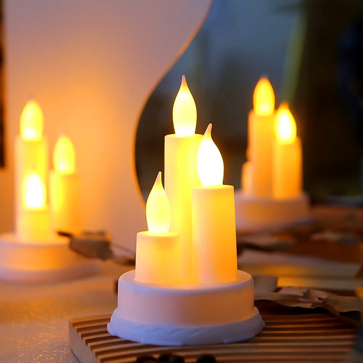 Top-down view of an LED taper candle, highlighting its sleek design and warm glow.