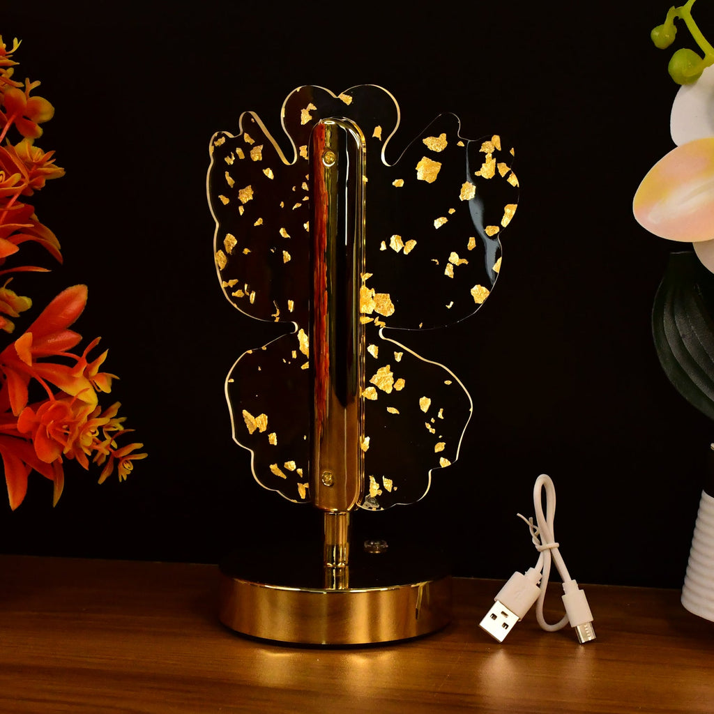 Decorative crystal LED table lamp glowing warmly on a wooden surface